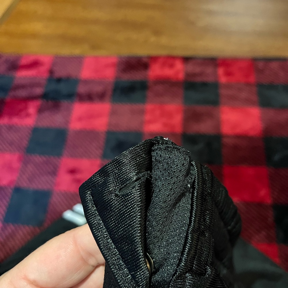 Black adidas pants that button down the sides missing top button on both sides